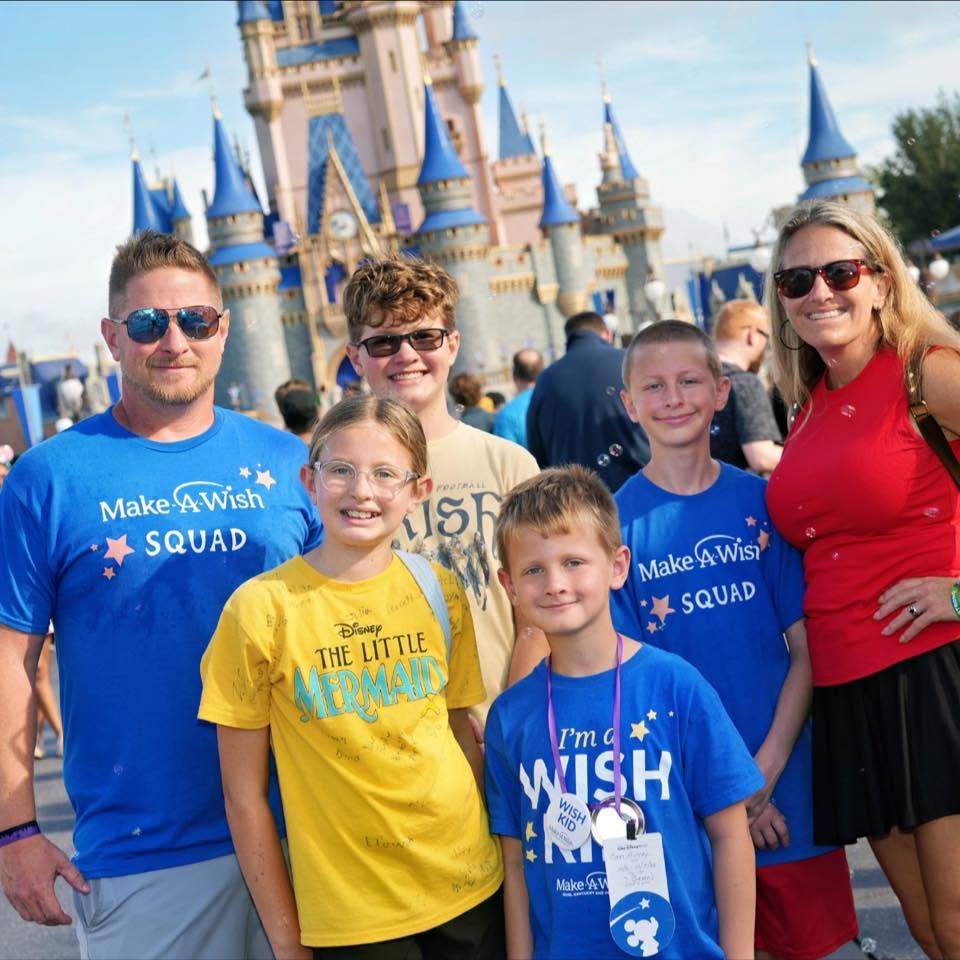 Jarrod W. Murray with his wife and four kids